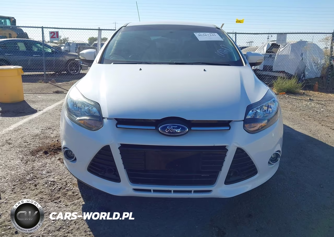 2013 Ford Focus Titanium VIN:1FADP3N22DL335585 - 12