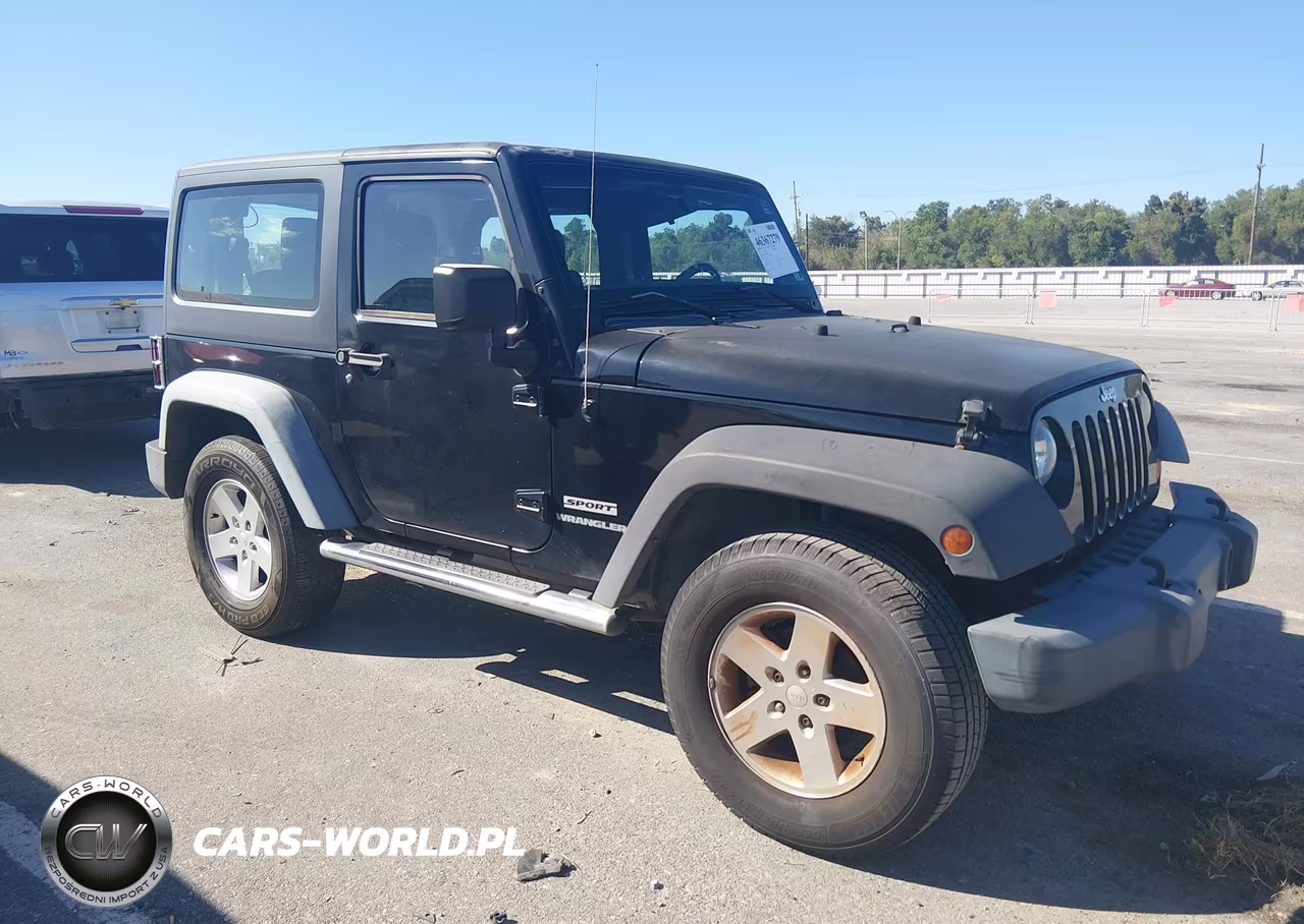 2011 Jeep Wrangler Sport VIN:1J4GA2D12BL606809 - 1