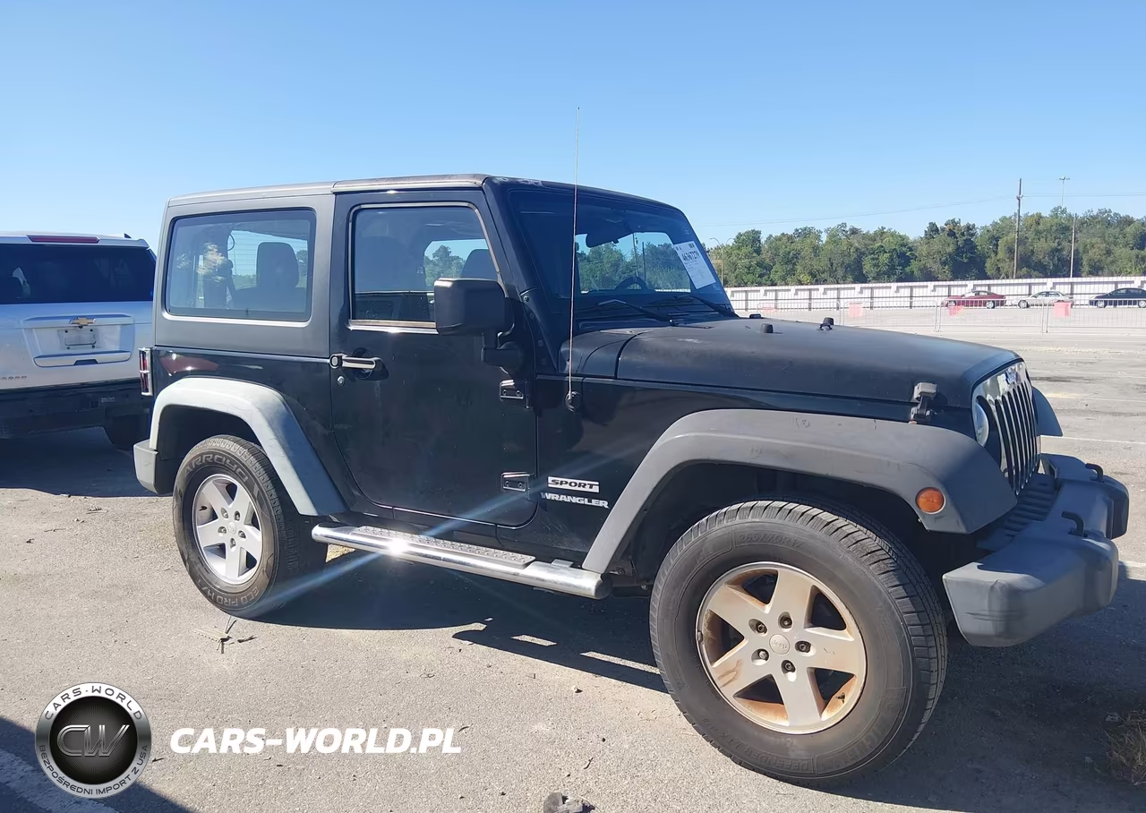 2011 Jeep Wrangler Sport VIN:1J4GA2D12BL606809 - 13