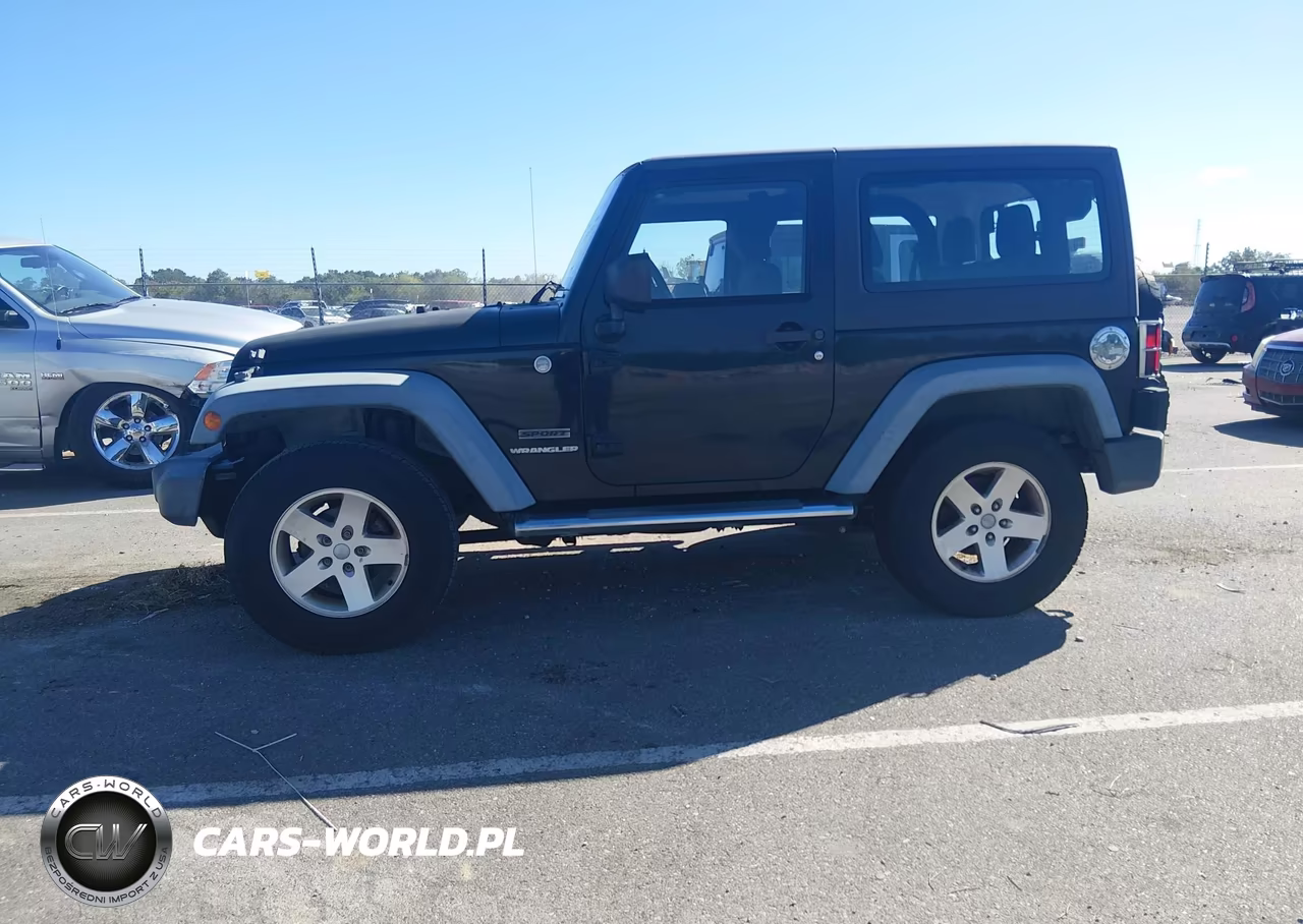 2011 Jeep Wrangler Sport VIN:1J4GA2D12BL606809 - 14