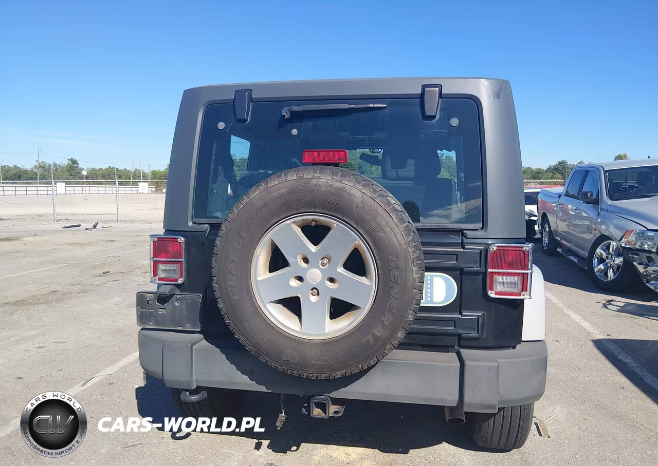 2011 Jeep Wrangler Sport VIN:1J4GA2D12BL606809 - 16