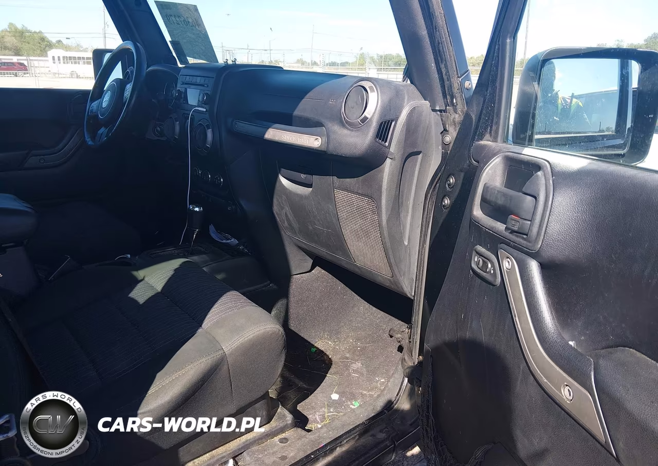 2011 Jeep Wrangler Sport VIN:1J4GA2D12BL606809 - 5