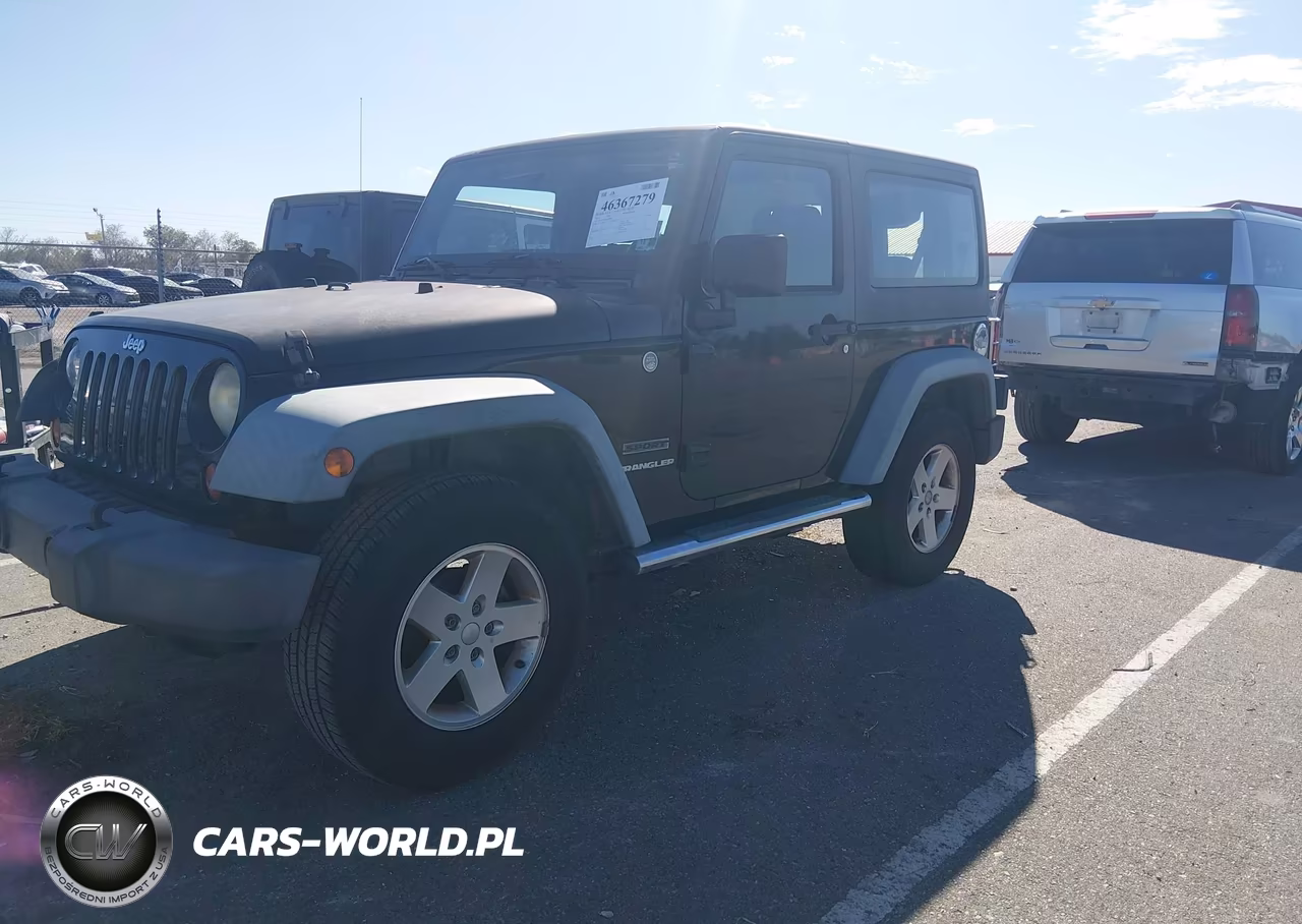 2011 Jeep Wrangler Sport VIN:1J4GA2D12BL606809 - 6