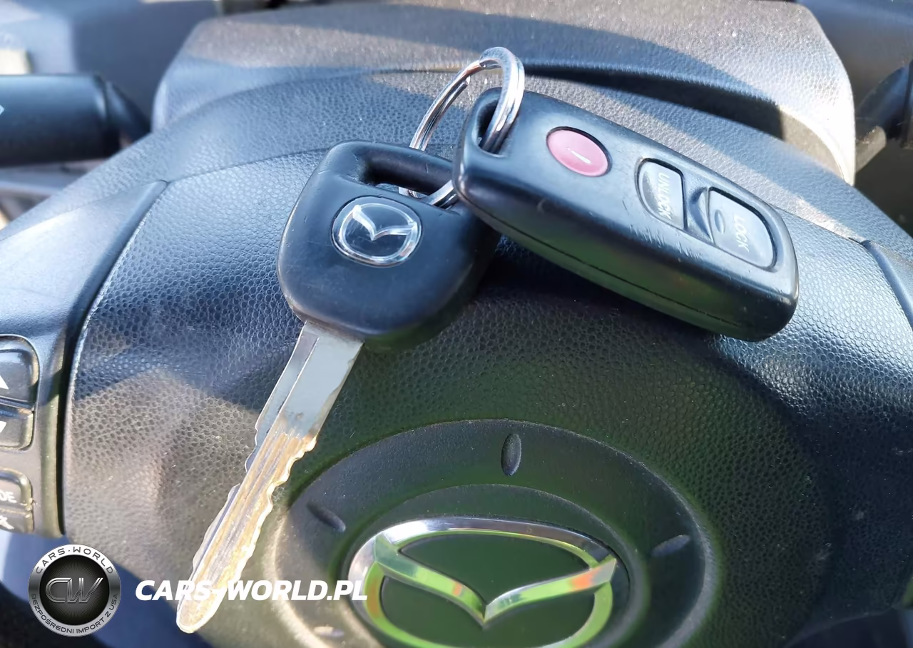2006 Mazda Mazda3 I VIN:JM1BK12G461420382 - 11