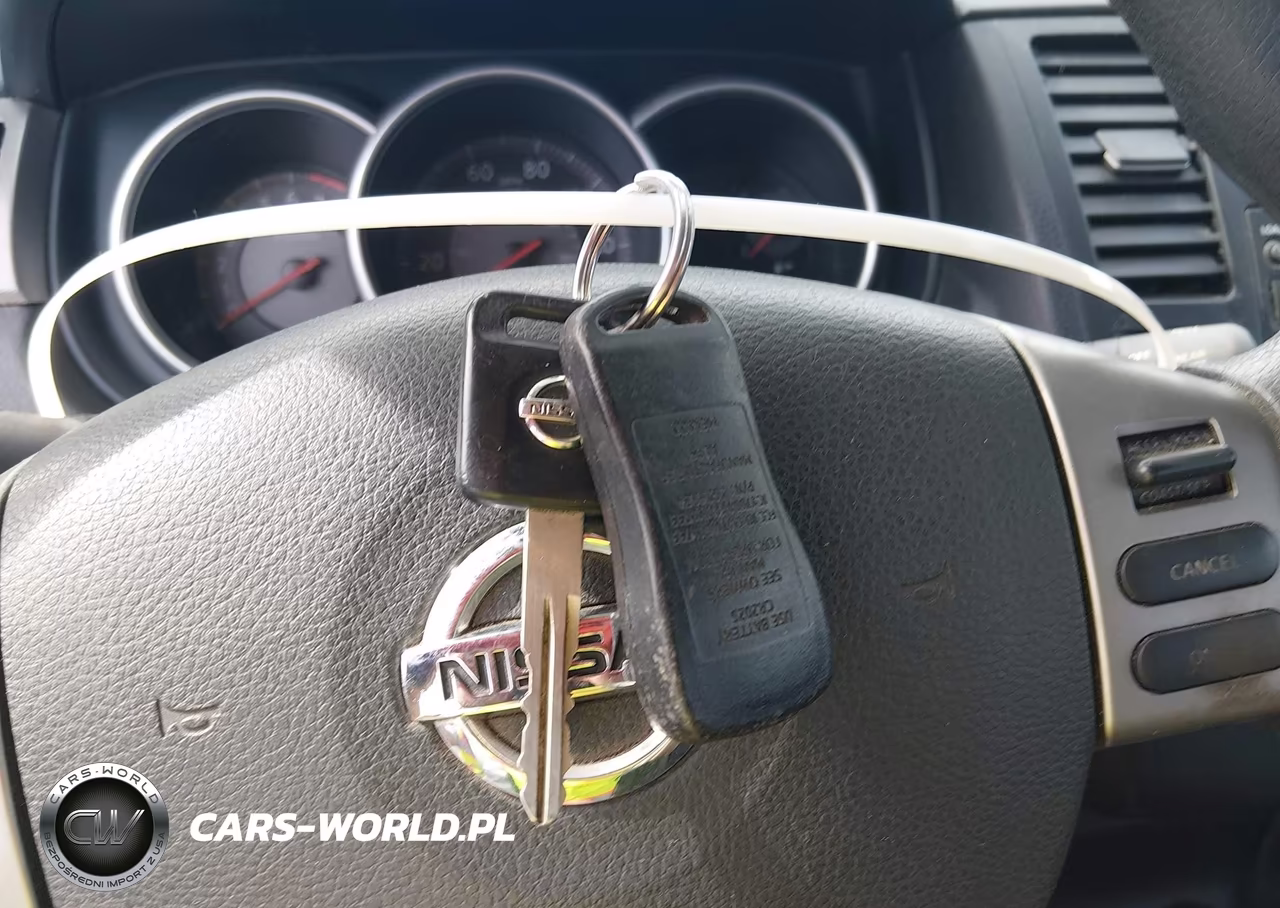 2009 Nissan Versa 1.8Sl VIN:3N1BC13E29L420651 - 11