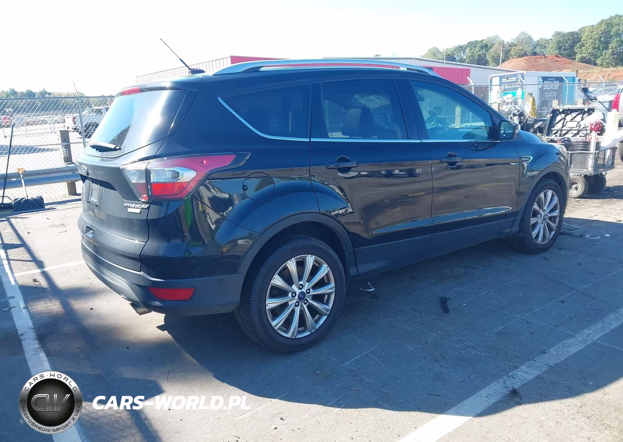 2017 Ford Escape Titanium VIN:1FMCU0J98HUA27137 - 4