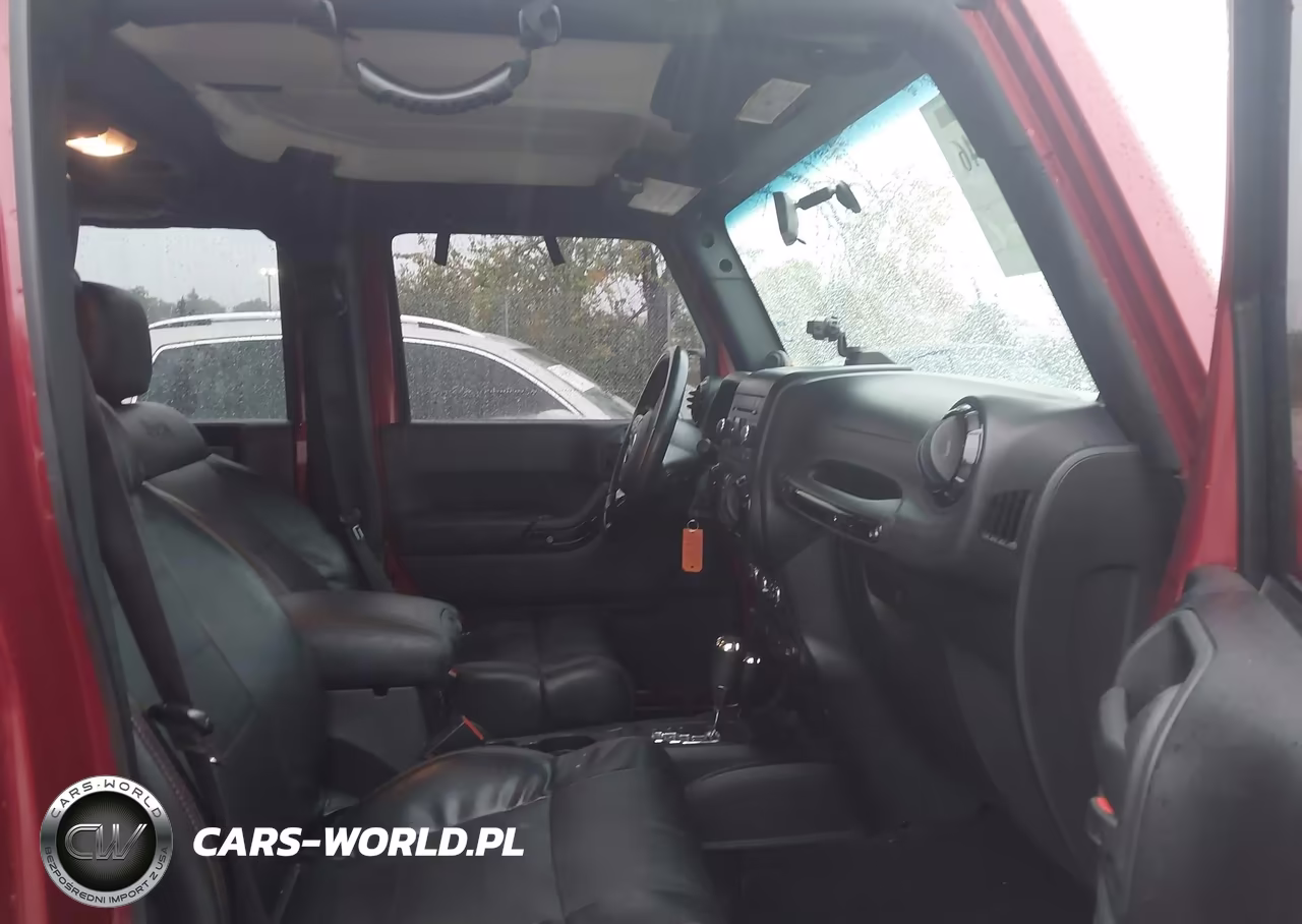 2012 Jeep Wrangler Unlimited Sahara VIN:1C4BJWEG4CL256479 - 5