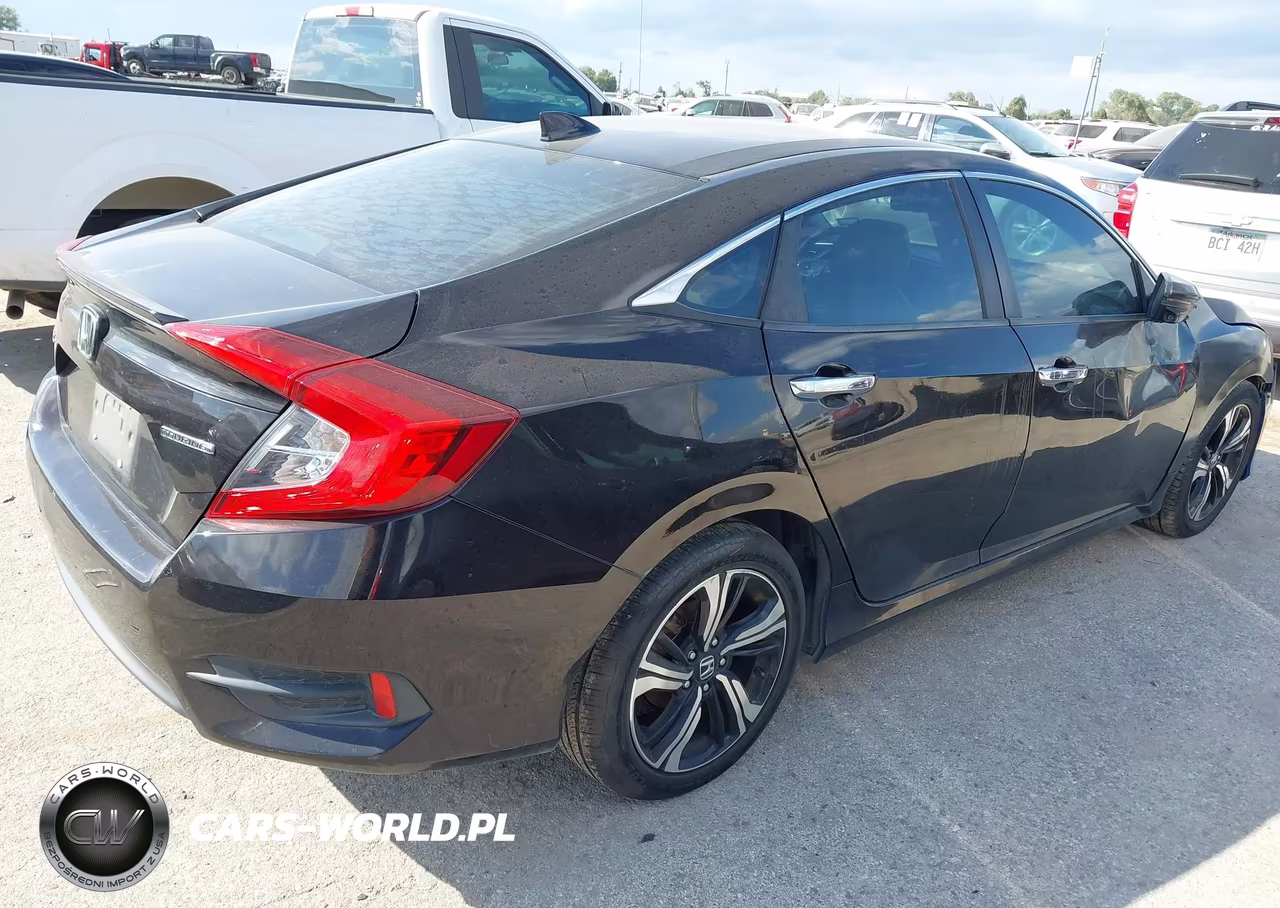 2016 Honda Civic Touring VIN:19XFC1F99GE003347 - 4