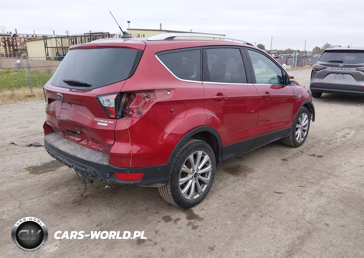 2018 Ford Escape Titanium VIN:1FMCU0J93JUC69632 - 4