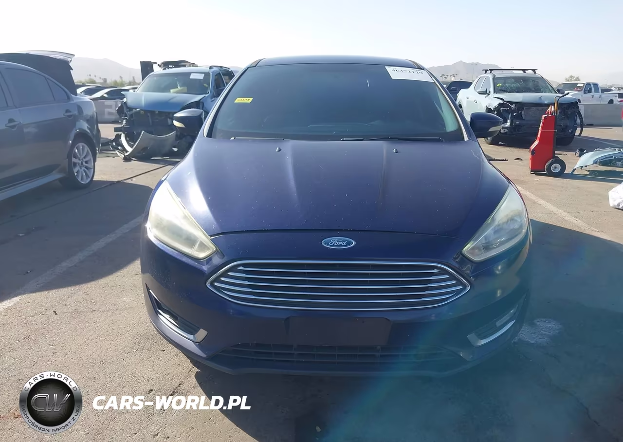 2016 Ford Focus Titanium VIN:1FADP3N20GL321477 - 13