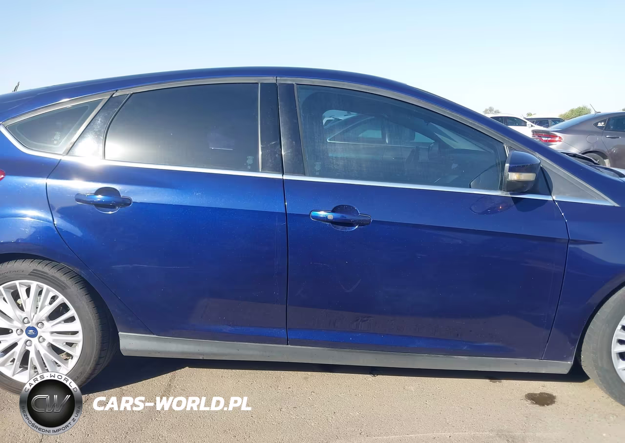 2016 Ford Focus Titanium VIN:1FADP3N20GL321477 - 14