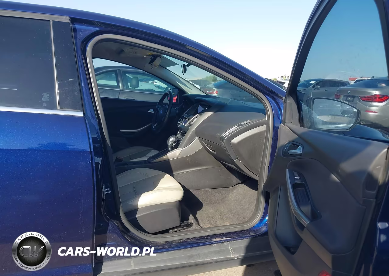 2016 Ford Focus Titanium VIN:1FADP3N20GL321477 - 5
