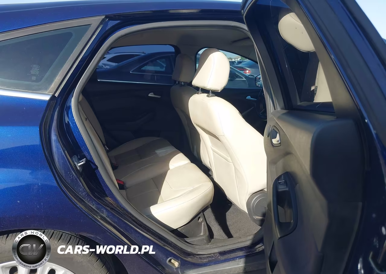 2016 Ford Focus Titanium VIN:1FADP3N20GL321477 - 8