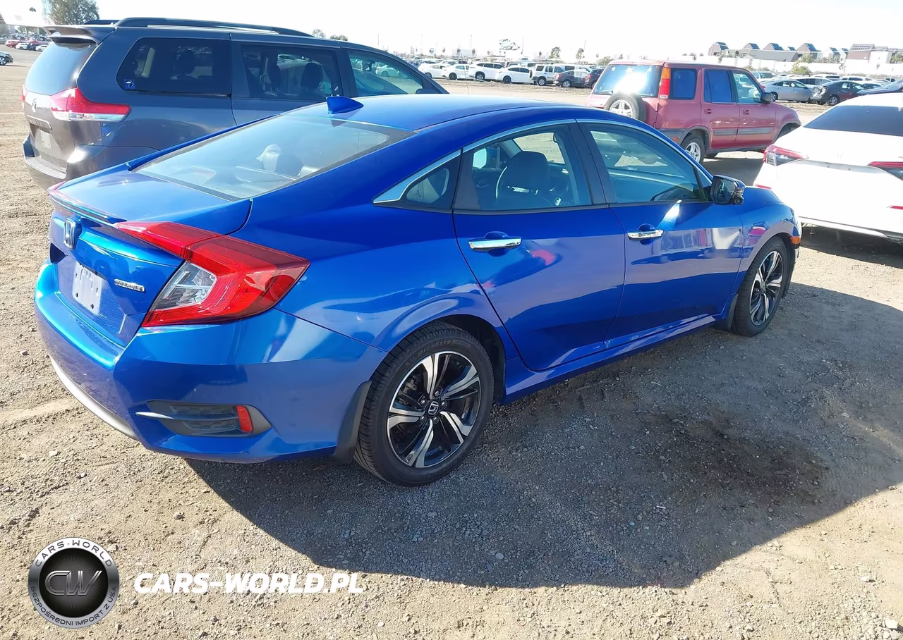 2017 Honda Civic Touring VIN:2HGFC1F94HH641559 - 4