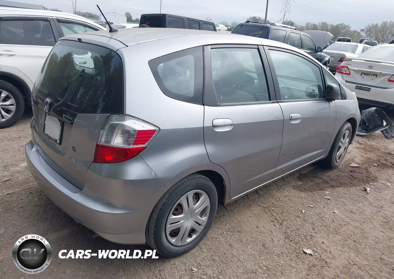 2009 Honda Fit VIN:JHMGE88289S021845 - 4