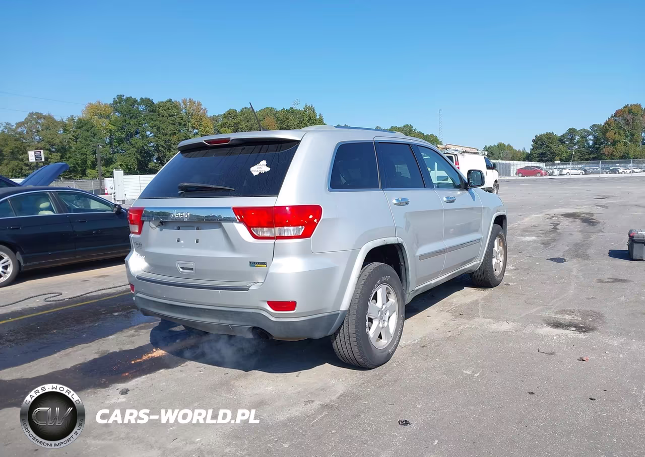 2012 Jeep Grand Cherokee Laredo VIN:1C4RJEAG5CC119615 - 4