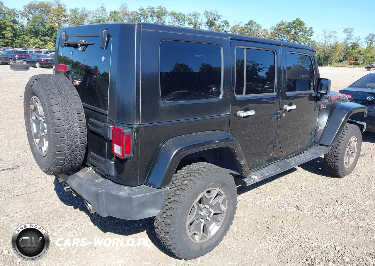2016 Jeep Wrangler Unlimited Rubicon VIN:1C4BJWFG7GL205952 - 4