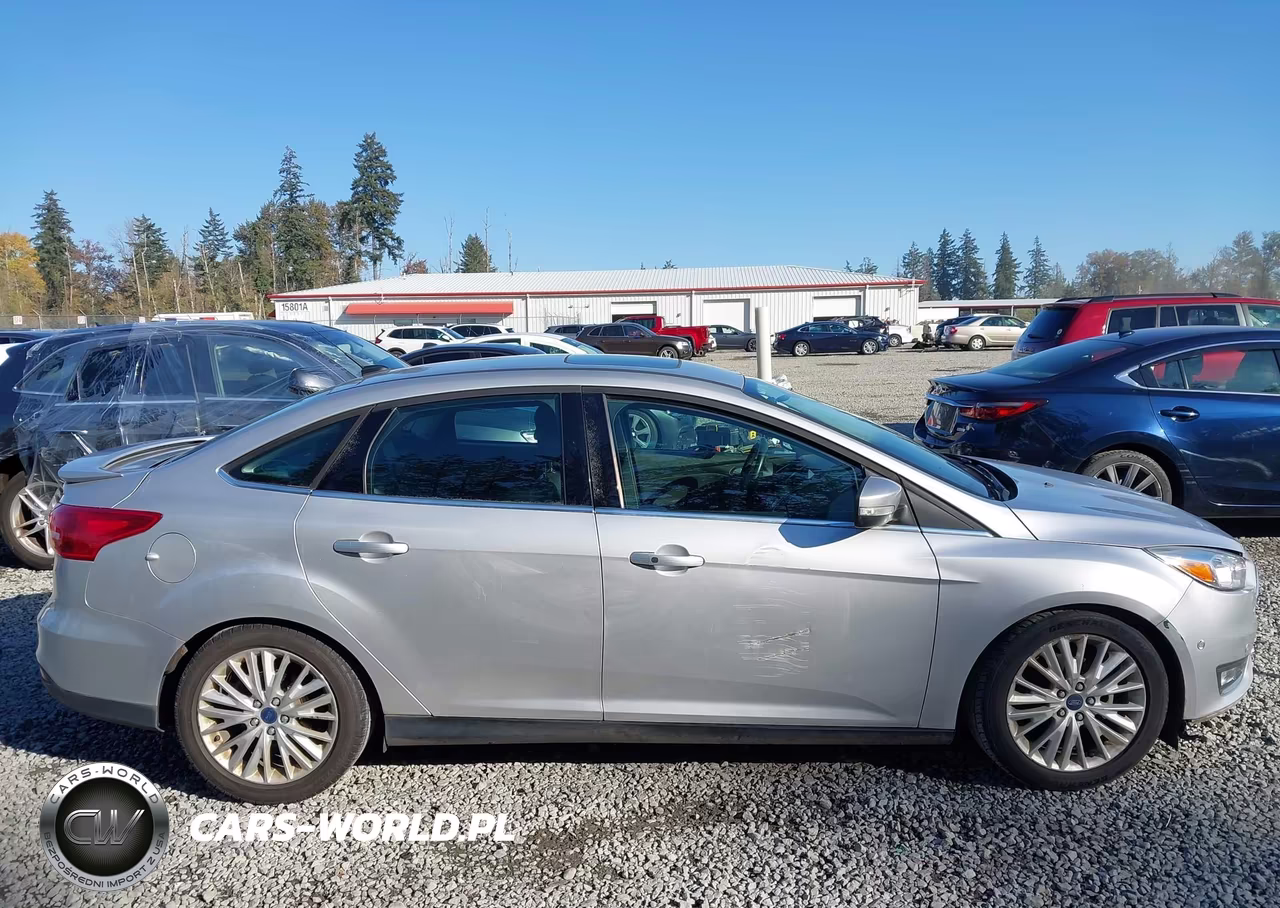 2015 Ford Focus Titanium VIN:1FADP3J20FL324108 - 13