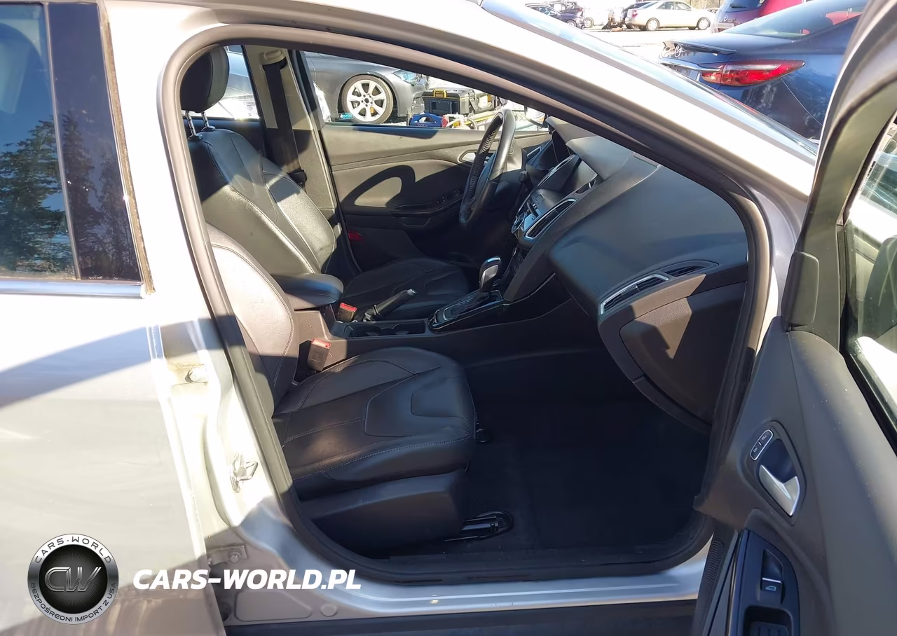 2015 Ford Focus Titanium VIN:1FADP3J20FL324108 - 17