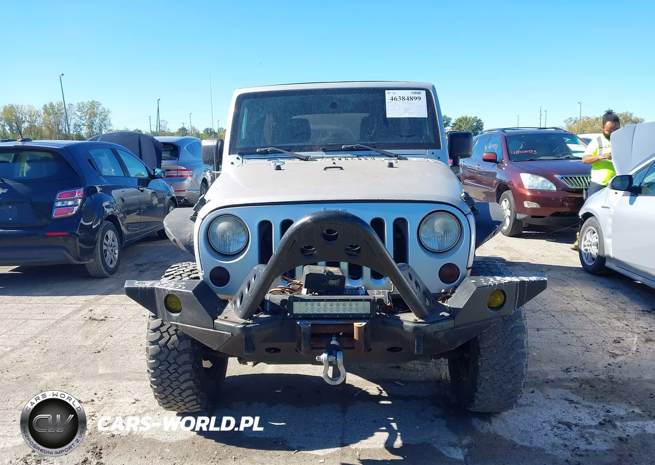 2012 Jeep Wrangler Unlimited Sport VIN:1C4BJWDG1CL200727 - 12