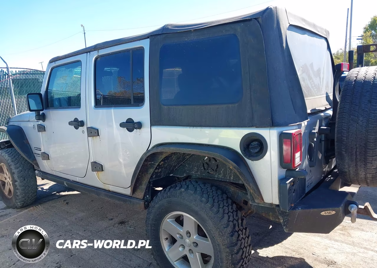 2012 Jeep Wrangler Unlimited Sport VIN:1C4BJWDG1CL200727 - 14