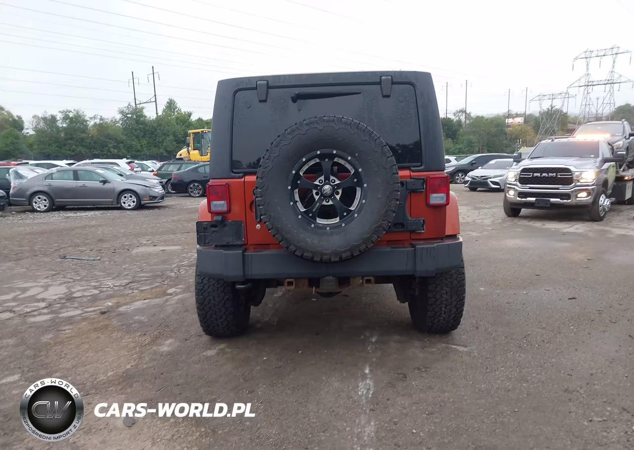 2014 Jeep Wrangler Unlimited Sahara VIN:1C4HJWEG9EL231252 - 16
