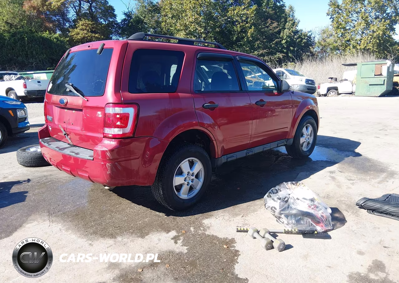 2010 Ford Escape Xlt VIN:1FMCU0D71AKA79673 - 4