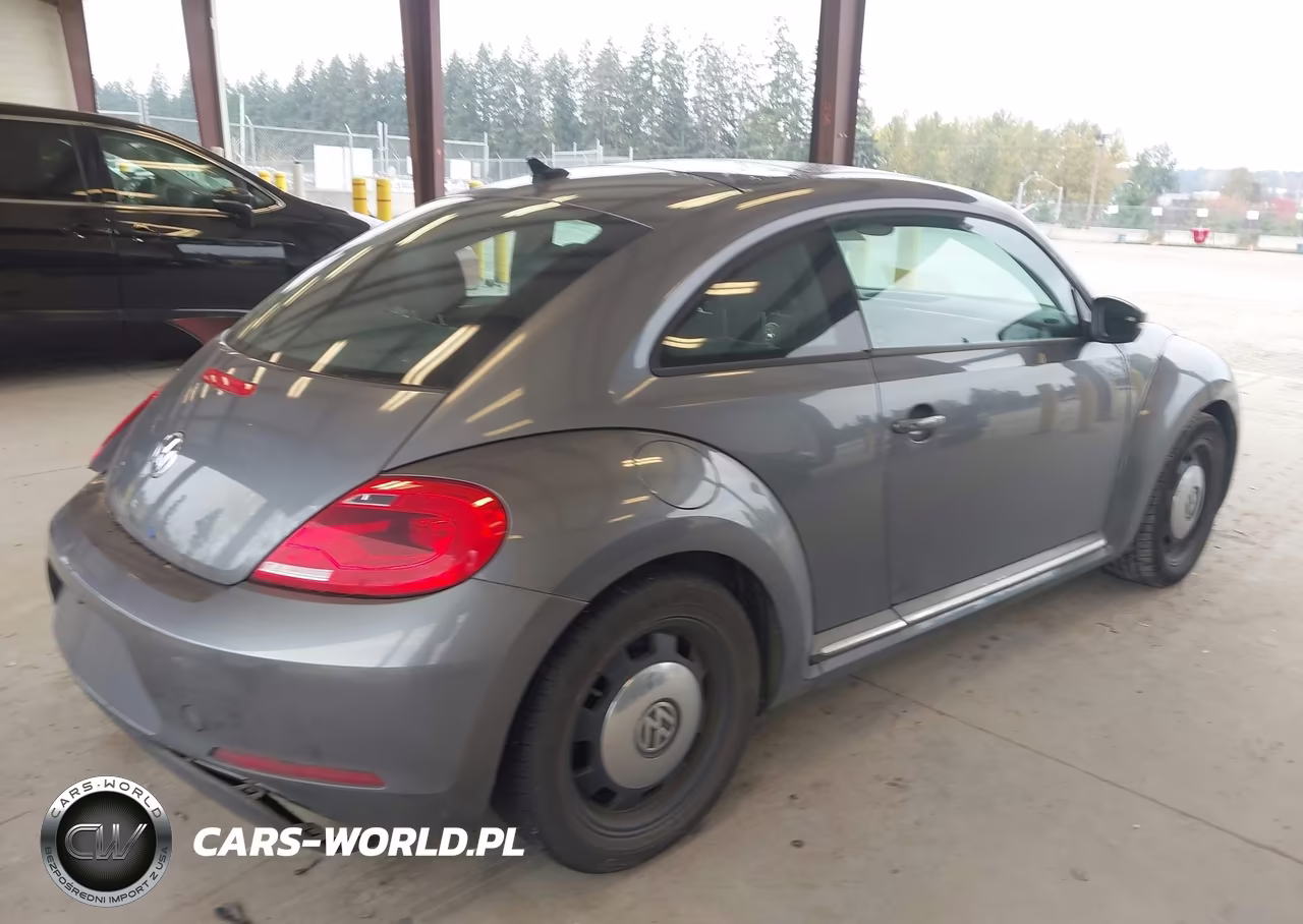 2014 Volkswagen Beetle 2.5L VIN:3VWJP7AT4EM602032 - 4