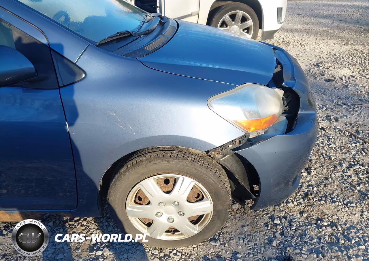 2009 Toyota Yaris VIN:JTDBT903991315238 - 12