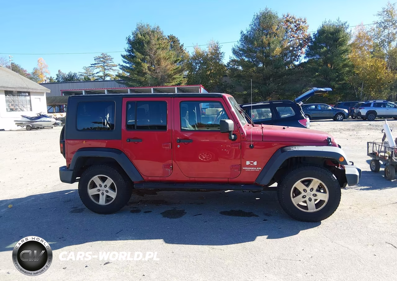 2007 Jeep Wrangler Unlimited X VIN:1J4GA39157L189935 - 13