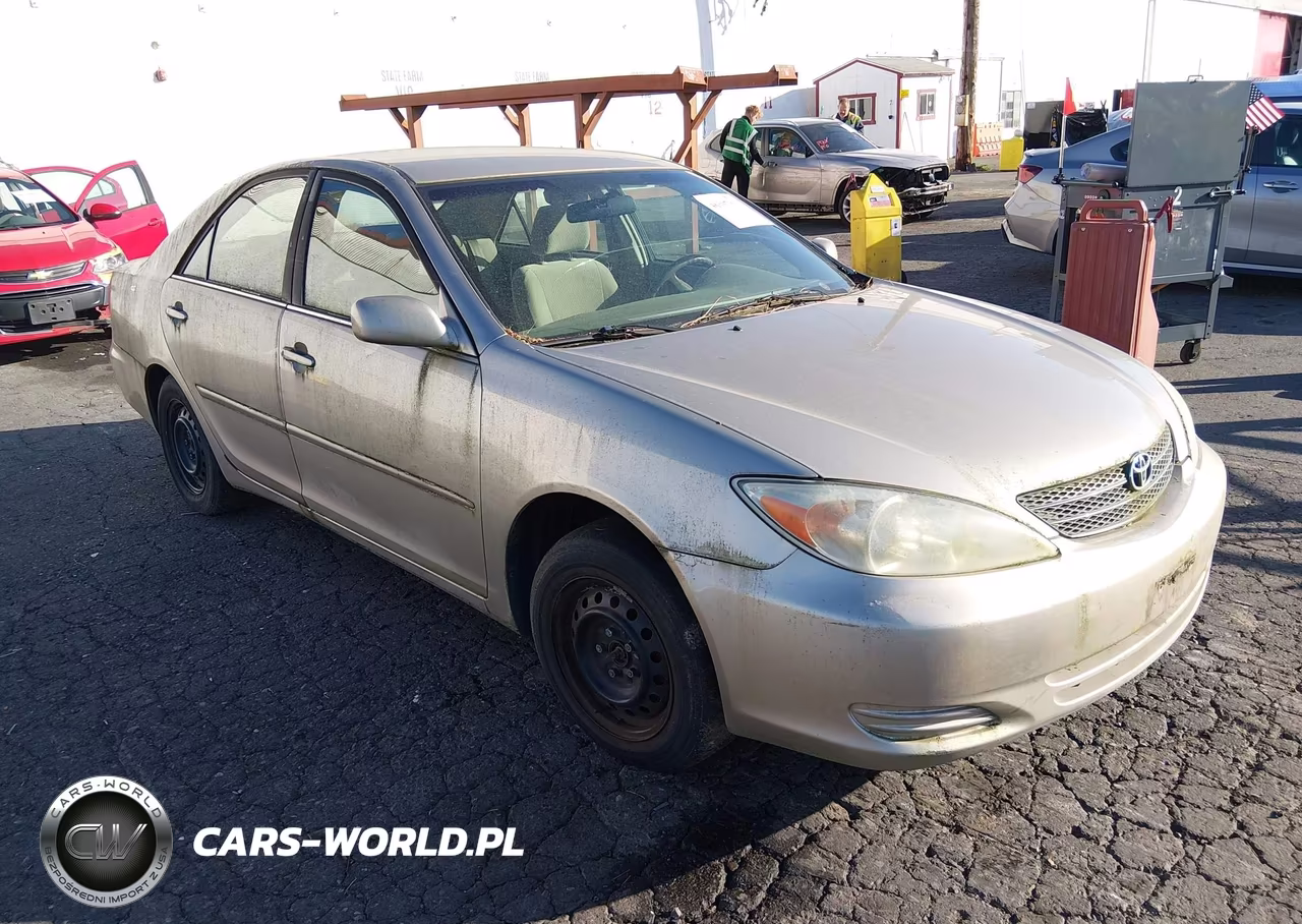 2002 Toyota Camry Le VIN:4T1BE32K32U634677 - 1
