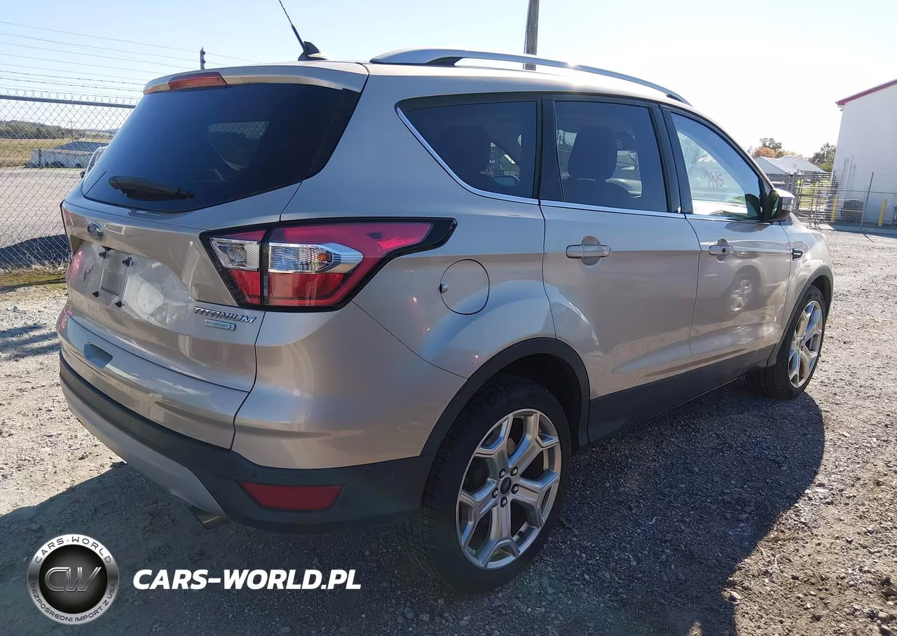 2018 Ford Escape Titanium VIN:1FMCU0J98JUD34250 - 4