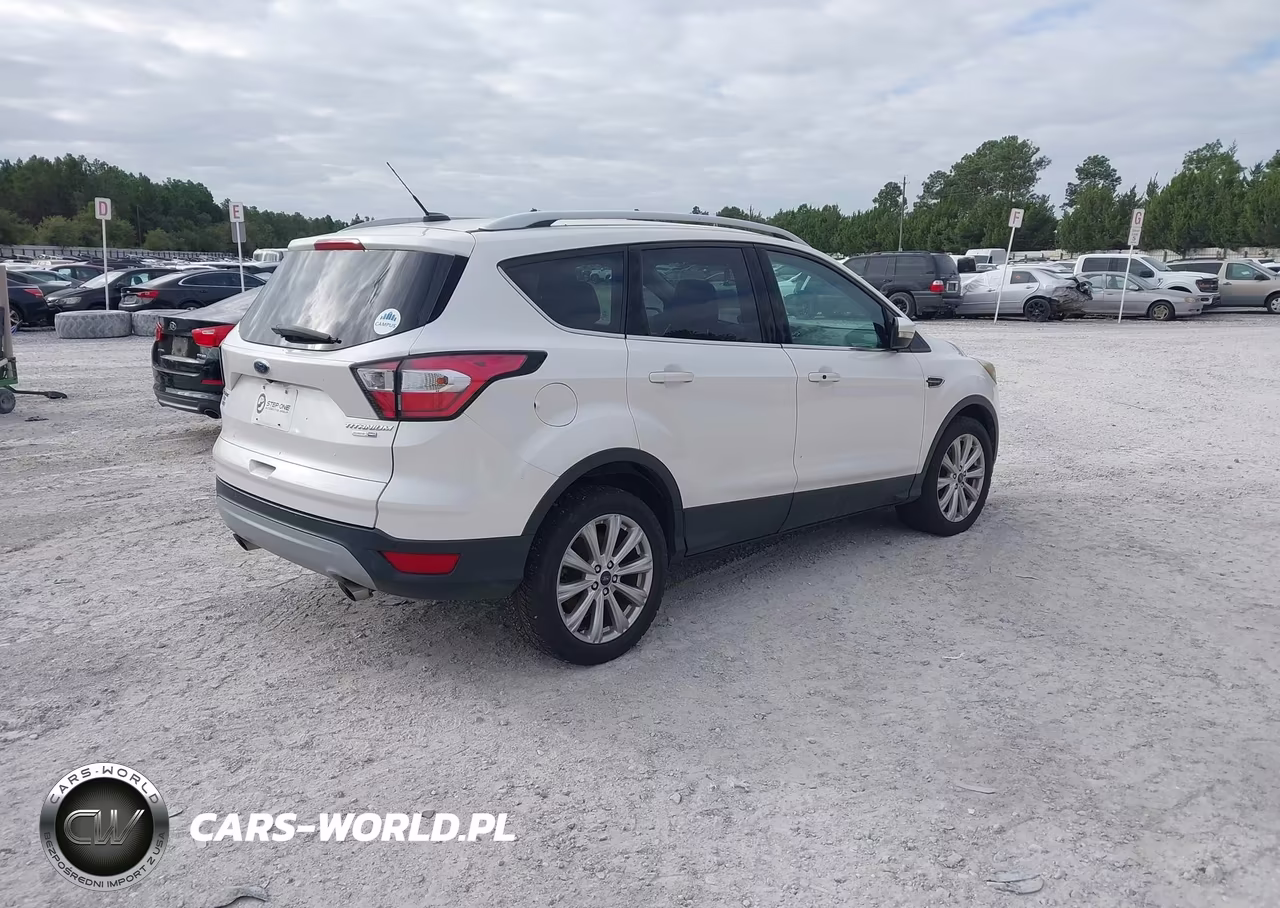 2017 Ford Escape Titanium VIN:1FMCU9J99HUE25056 - 4
