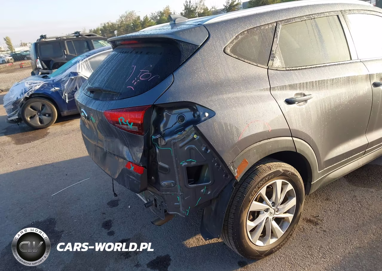 2019 Hyundai Tucson Value VIN:KM8J33A40KU031884 - 19