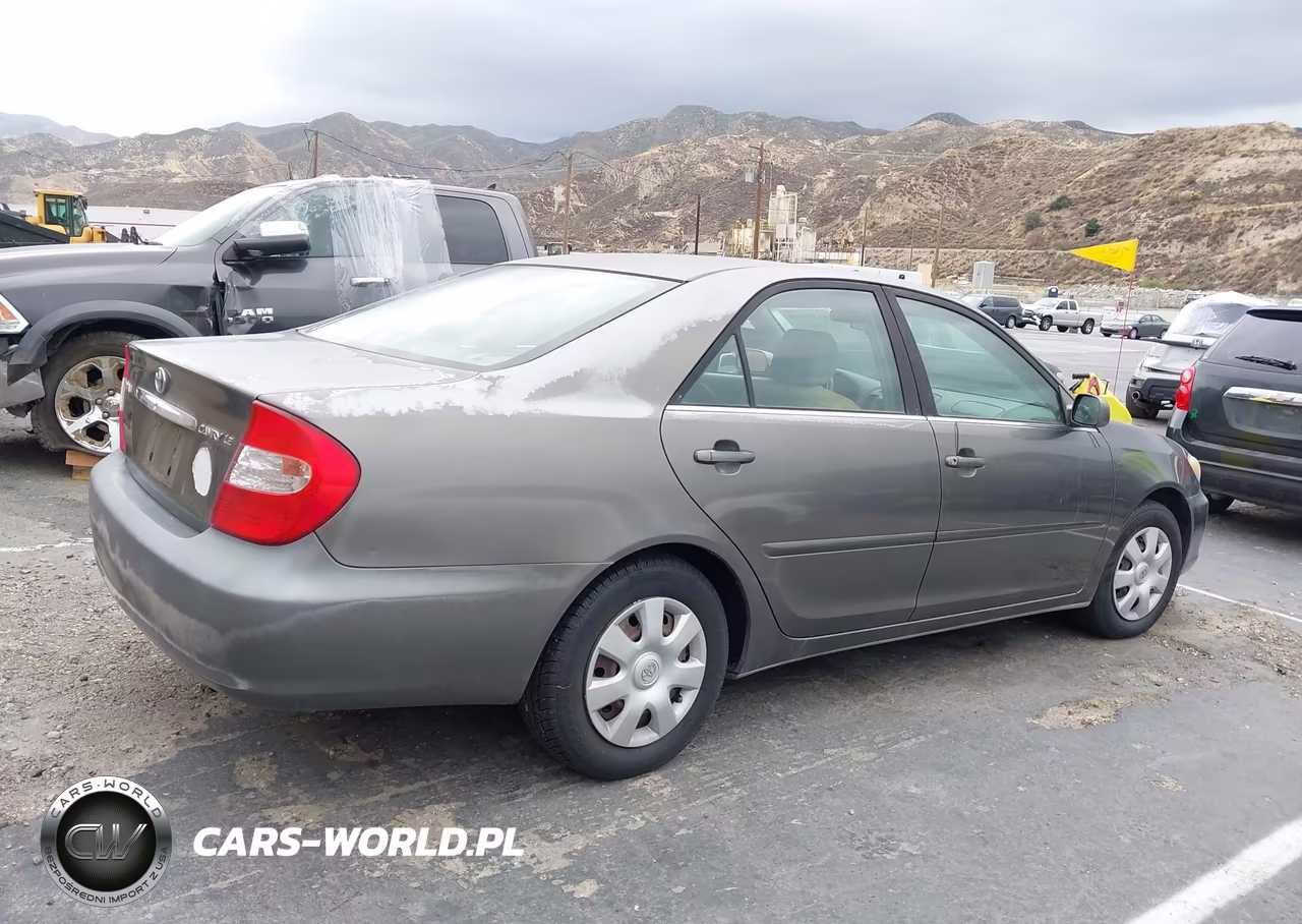 2003 Toyota Camry Le VIN:JTDBE32K130183505 - 4