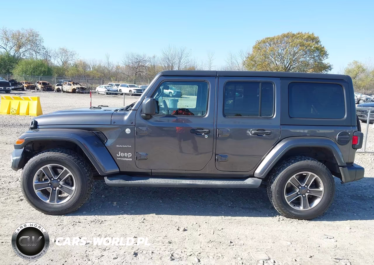 2019 Jeep Wrangler Unlimited Sahara 4X4 VIN:1C4HJXEN2KW590148 - 14