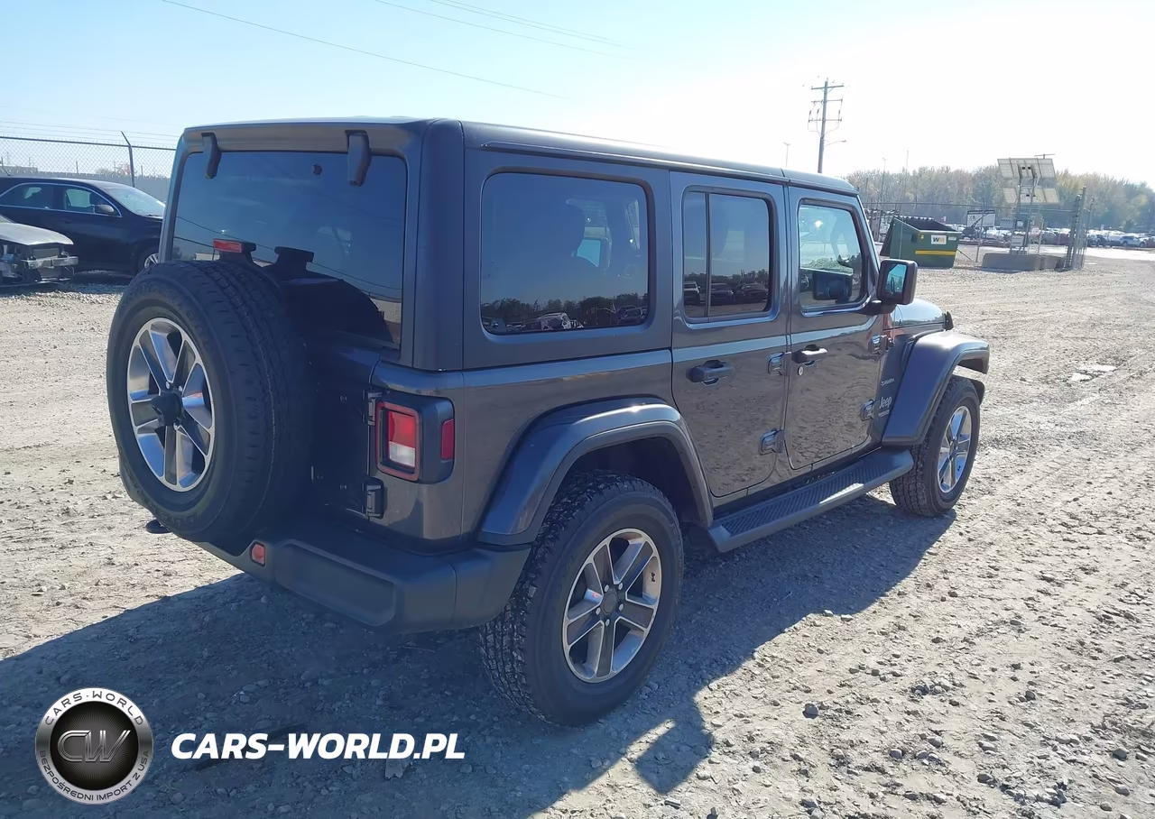 2019 Jeep Wrangler Unlimited Sahara 4X4 VIN:1C4HJXEN2KW590148 - 4