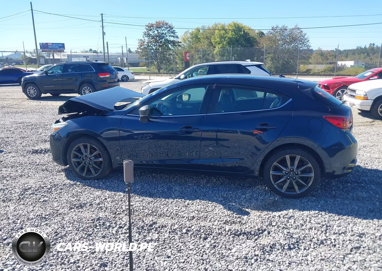 2018 Mazda Mazda3 Touring VIN:3MZBN1L35JM212992 - 14