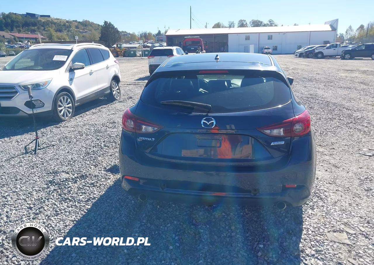 2018 Mazda Mazda3 Touring VIN:3MZBN1L35JM212992 - 16
