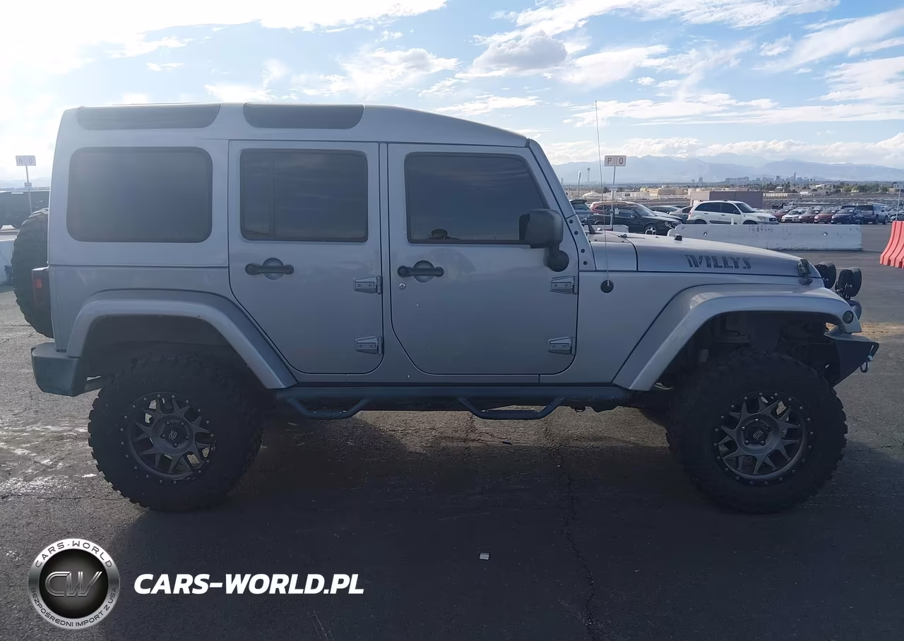 2015 Jeep Wrangler Unlimited Willys Wheeler VIN:1C4BJWDG4FL758835 - 13