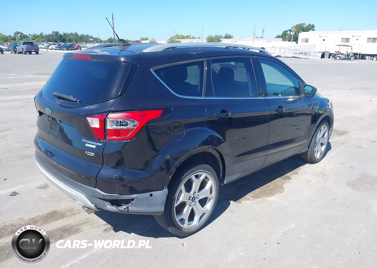 2019 Ford Escape Titanium VIN:1FMCU0J95KUA12067 - 4
