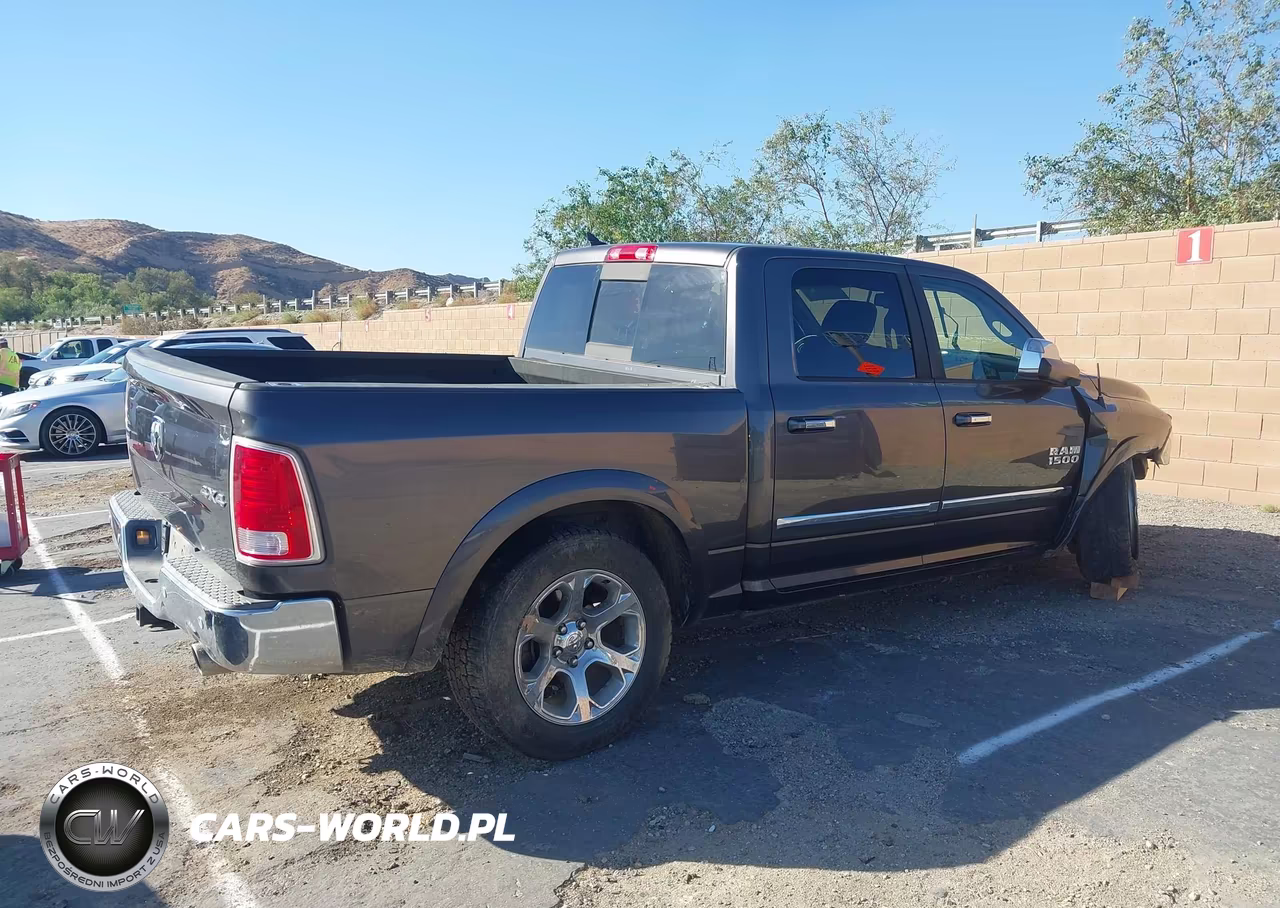 2015 Ram 1500 Laramie VIN:1C6RR7NM4FS734081 - 4