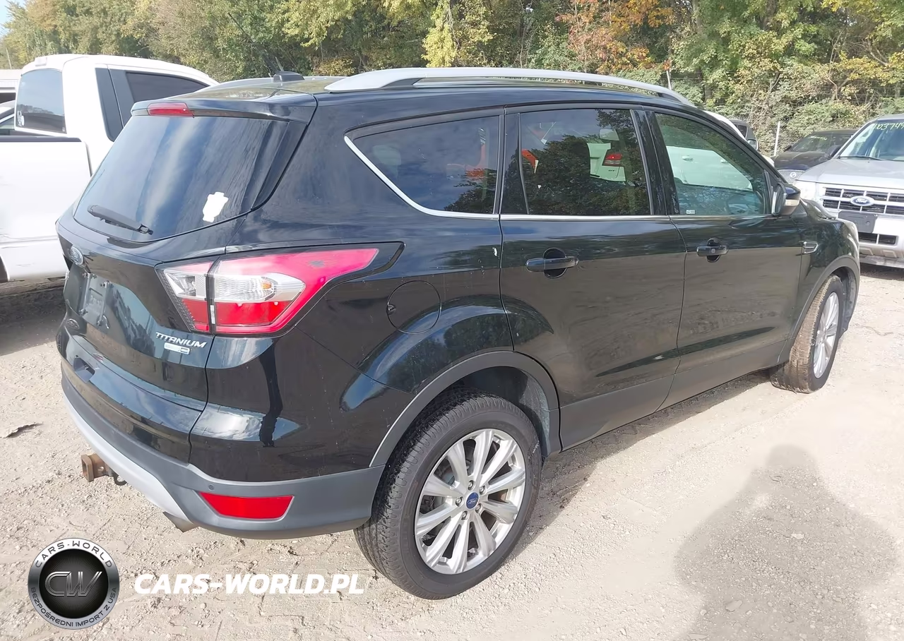 2017 Ford Escape Titanium VIN:1FMCU9J99HUB58579 - 4