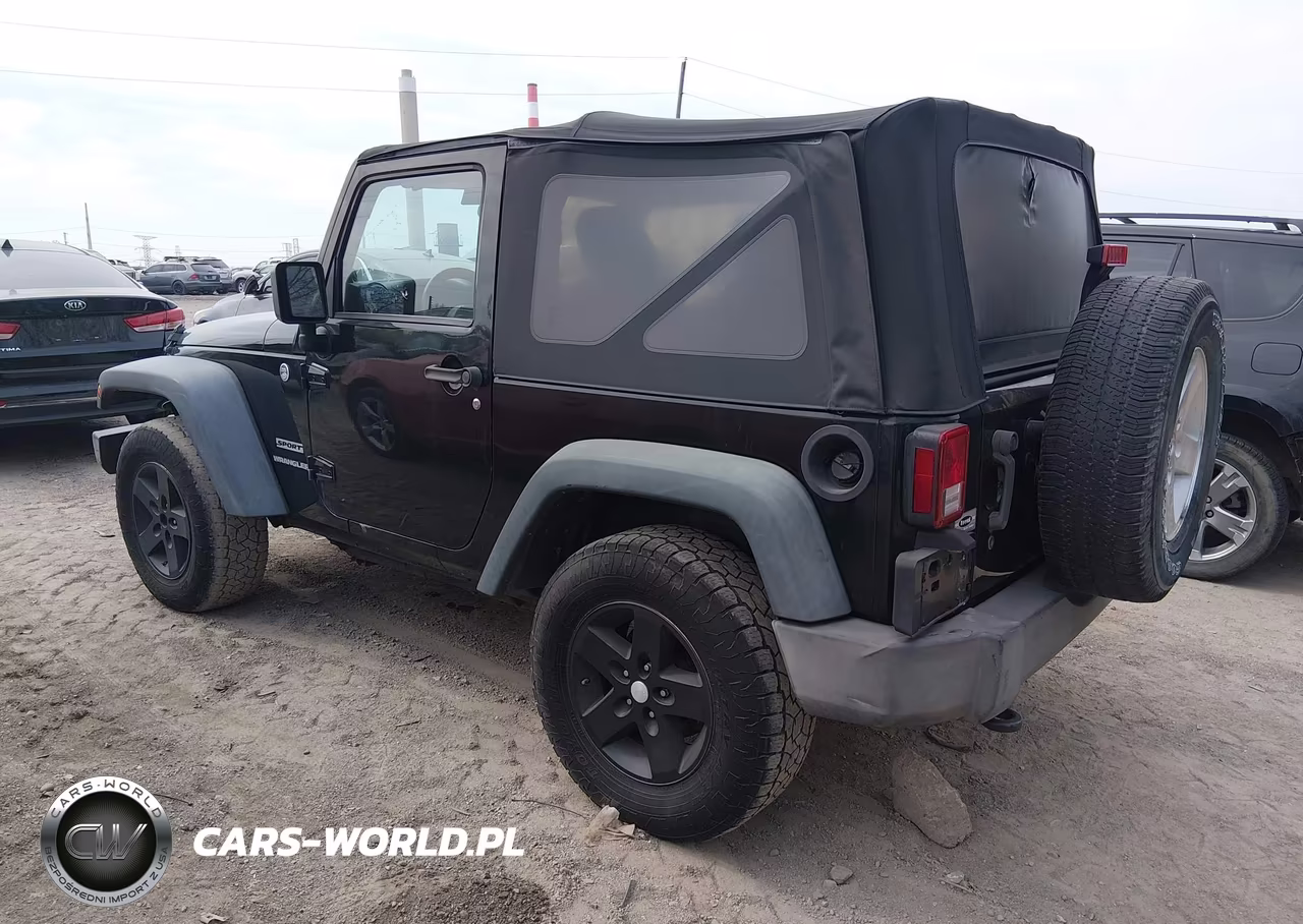 2012 Jeep Wrangler Sport VIN:1C4AJWAGXCL256312 - 3