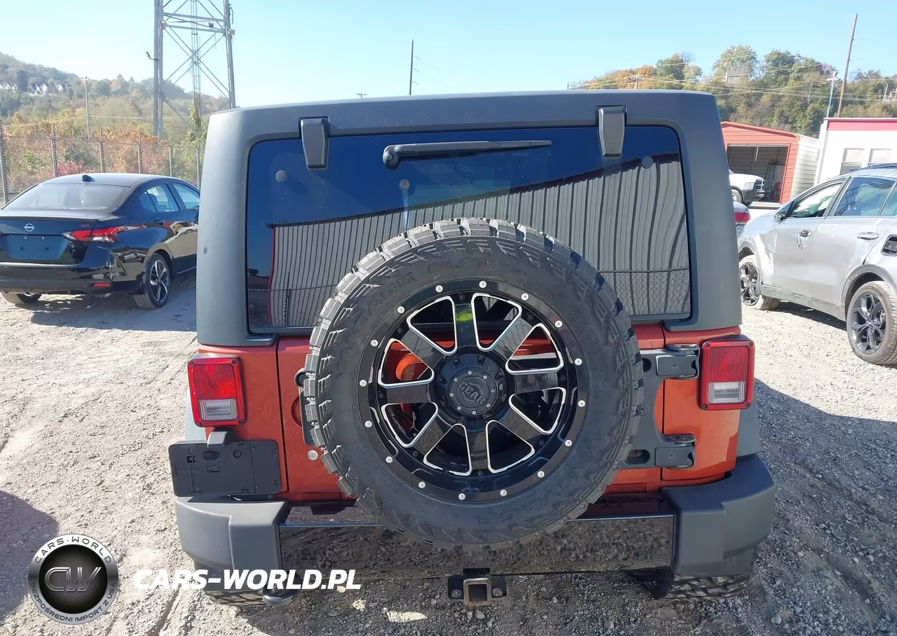 2014 Jeep Wrangler Unlimited Sport VIN:1C4BJWDGXEL169139 - 16