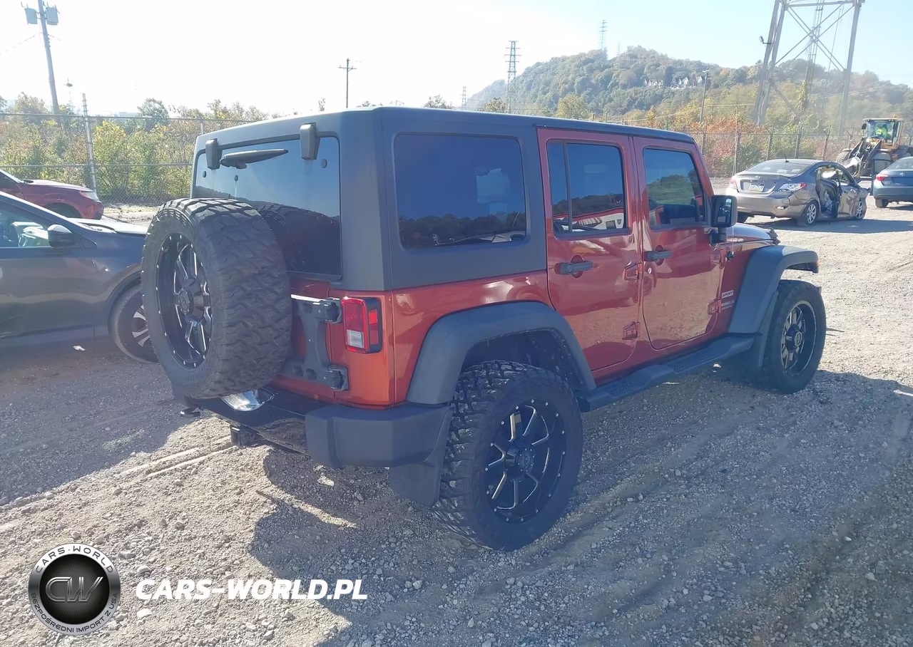 2014 Jeep Wrangler Unlimited Sport VIN:1C4BJWDGXEL169139 - 4