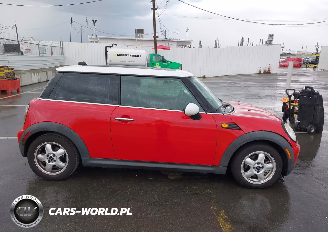 2009 Mini Cooper VIN:WMWMF33509TW76725 - 13