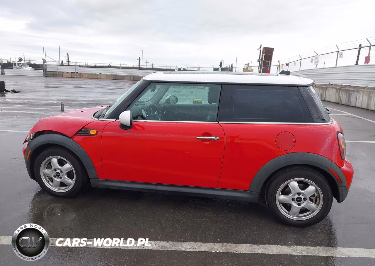 2009 Mini Cooper VIN:WMWMF33509TW76725 - 14