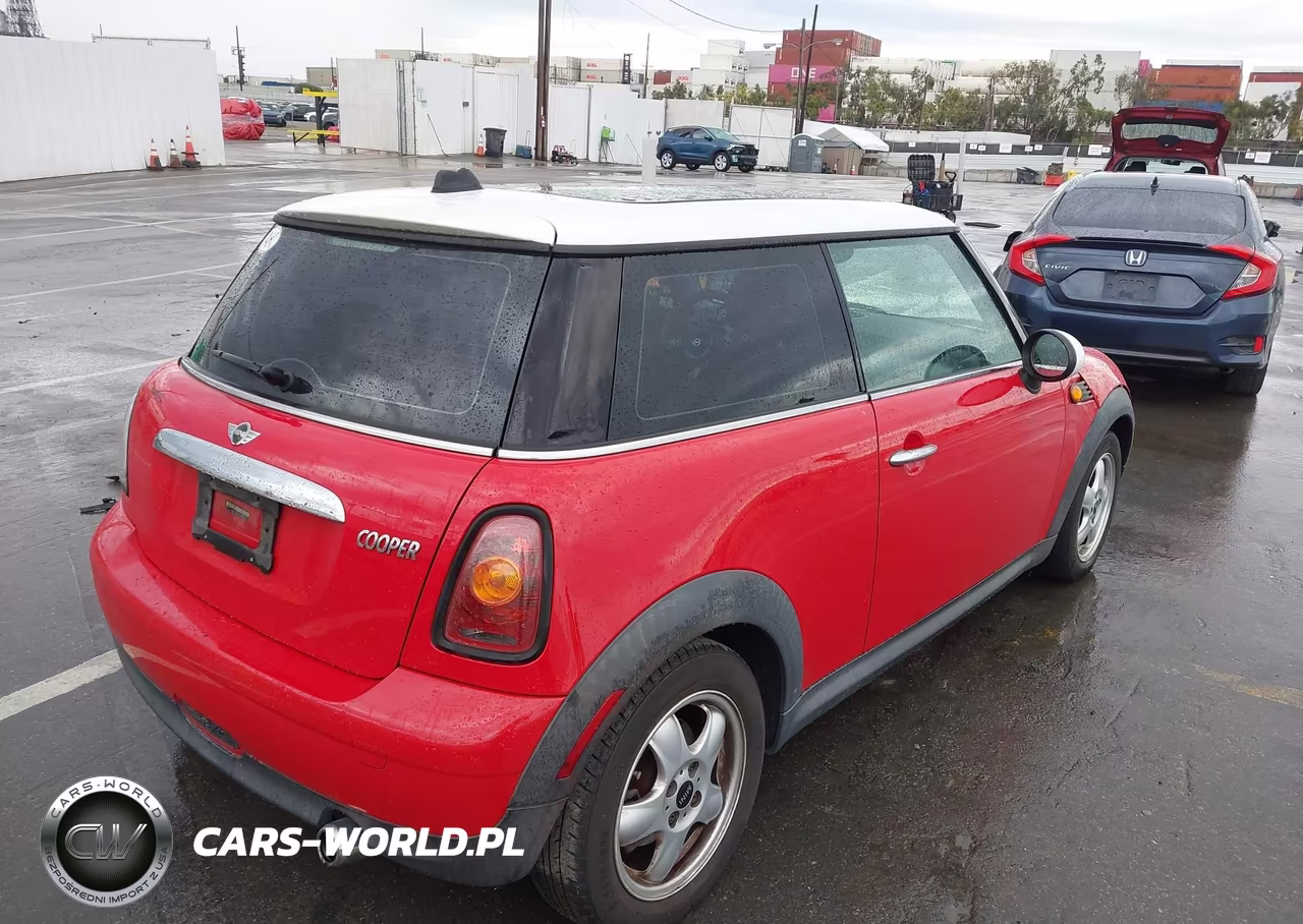 2009 Mini Cooper VIN:WMWMF33509TW76725 - 4