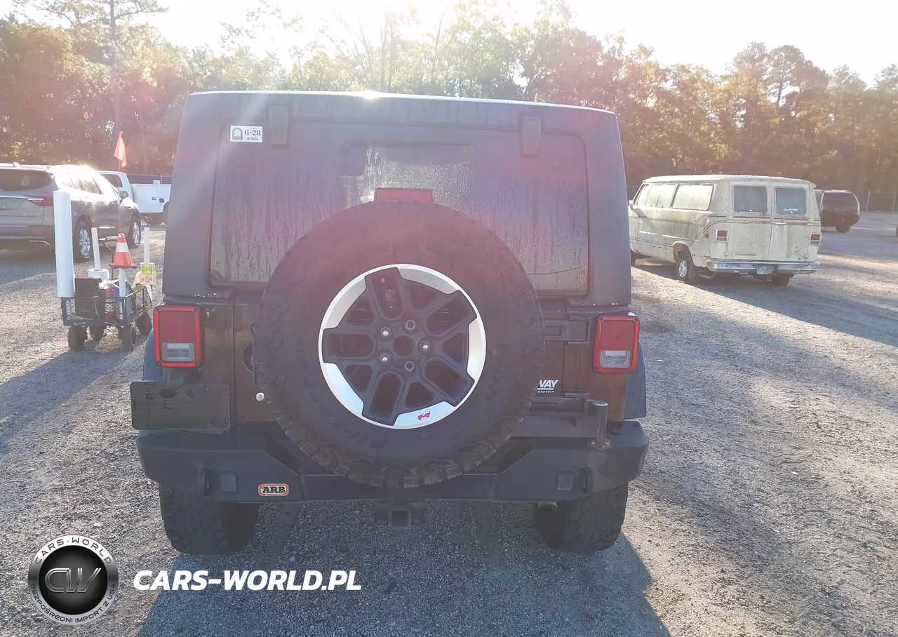 2013 Jeep Wrangler Unlimited Sahara VIN:1C4HJWEG3DL525308 - 16